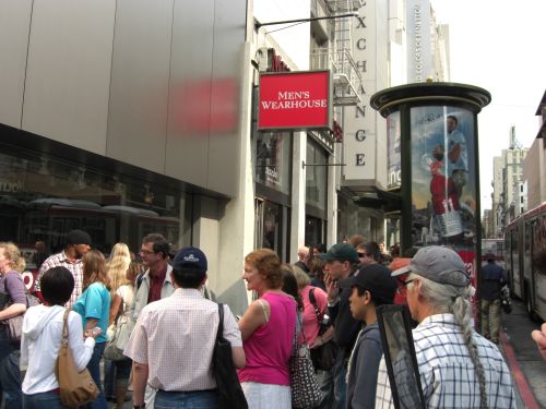 Line of customers outside the Apple Store in downtown San Francisco Line of customers outside the Apple Store in downtown San Francisco