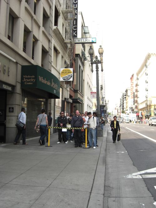 Line of customers outside the Apple Store in downtown San Francisco Line of customers outside the Apple Store in downtown San Francisco