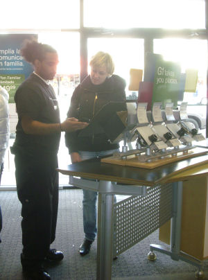 A shopper at a T-Mobile store in New York City on launch day for the G1 Android phone. A shopper at a T-Mobile store in New York City on launch day for the G1 Android phone.