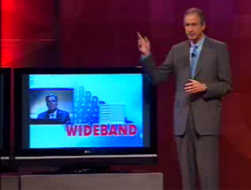 Comcast CEO Brian Roberts demonstrating the benefits of wideband downloads during CES 2008 on January 8.