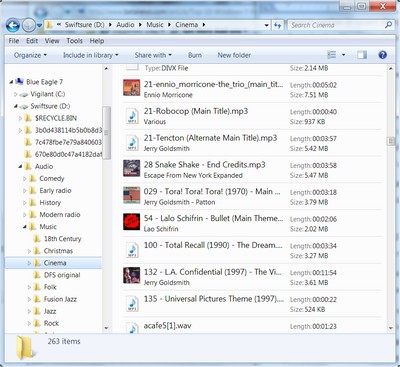 Content View in Windows 7 Explorer automatically places album art alongside your MP3 files.