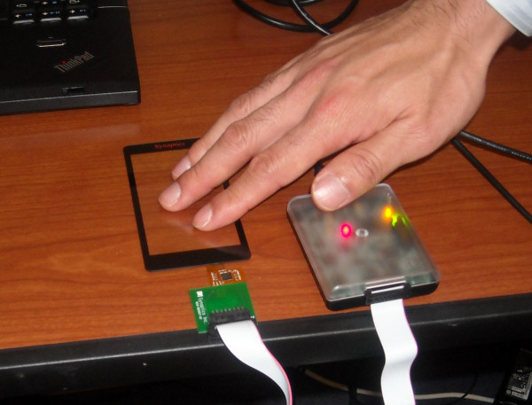 A prototype of Synaptics' ClearPad is shown here attached to an old IBM ThinkPad.
